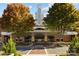 Charming movie theatre entrance features red brick facade with symmetrical landscaping and a vintage marquee at 7710 Epping Forest Dr, Huntersville, NC 28078