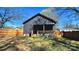 Spacious backyard with lush green grass, privacy fence, and charming back porch at 782 Chalice Sw St, Concord, NC 28027