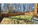 Large and well maintained backyard with full wooden privacy fence, and ample green space at 782 Chalice Sw St, Concord, NC 28027