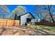 Large backyard showing the newly installed fence and wooden porch area at 782 Chalice Sw St, Concord, NC 28027
