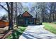 Charming home with a welcoming blue door, well-manicured lawn and lengthy driveway at 782 Chalice Sw St, Concord, NC 28027