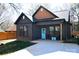 A close exterior of a home featuring a front porch with black seating and a front door with letter at 782 Chalice Sw St, Concord, NC 28027