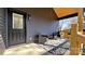 Charming outdoor porch area featuring modern furniture and stylish black-and-white rug at 782 Chalice Sw St, Concord, NC 28027
