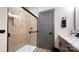 Sleek shower with glass door and tiled walls, complemented by modern fixtures and minimalist design at 782 Chalice Sw St, Concord, NC 28027