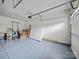 Spacious garage with ample room for storage and parking at 9582 Creighton Nw Rd, Concord, NC 28027