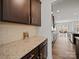 Modern kitchen featuring granite countertops, ample cabinetry, and stainless steel appliances at 9582 Creighton Nw Rd, Concord, NC 28027