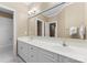 Bathroom featuring double sinks and white countertops at 10809 Wicklow Brook Ct, Charlotte, NC 28277