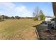 Spacious backyard features large grassy area and patio with picnic table at 1104 Crestview Dr, Salisbury, NC 28146