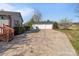 Long driveway leading to a three-car detached garage, house and yard at 1104 Crestview Dr, Salisbury, NC 28146