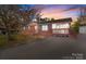 Charming brick home with light blue shutters, front porch, and a spacious driveway at 1104 Crestview Dr, Salisbury, NC 28146