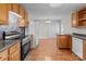 Functional kitchen with dining area and laminate flooring at 1104 Crestview Dr, Salisbury, NC 28146