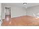 Inviting living room with laminate wood flooring and neutral paint at 1104 Crestview Dr, Salisbury, NC 28146