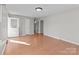 Spacious living room featuring laminate flooring and natural light at 1104 Crestview Dr, Salisbury, NC 28146