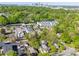 An aerial view of a neighborhood with mature trees, and the Charlotte skyline at 1114 Herrin Ave, Charlotte, NC 28205