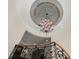 Grand foyer showcasing an ornate chandelier and elegant architectural details at 11236 Mcclure Manor Dr, Charlotte, NC 28277