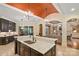 Open concept kitchen with marble countertops and seating area at 11236 Mcclure Manor Dr, Charlotte, NC 28277