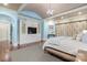 Bright main bedroom with hardwood floors, built-ins, and a large window at 11236 Mcclure Manor Dr, Charlotte, NC 28277