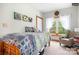 Cozy bedroom featuring carpet and a large window with natural light and peaceful views at 113 Duval Ct, Mooresville, NC 28117