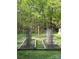 Well-maintained garden beds ready for planting, featuring protective fencing at 113 Duval Ct, Mooresville, NC 28117