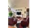 Cozy living room with large windows, comfortable seating, and stylish decor elements at 113 Duval Ct, Mooresville, NC 28117