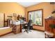 Bright office space with a large window, a built-in desk, and ample storage at 113 Duval Ct, Mooresville, NC 28117