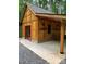 New outbuilding with a concrete slab and stained exterior at 113 Duval Ct, Mooresville, NC 28117