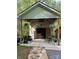 Charming outbuilding with covered patio and unique vintage decor at 113 Duval Ct, Mooresville, NC 28117