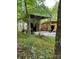 Charming outbuilding surrounded by lush greenery, providing a secluded retreat at 113 Duval Ct, Mooresville, NC 28117