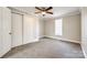 Comfortable bedroom with neutral carpet, ceiling fan, and a closet at 1157 Cedar Grove Ln, Rock Hill, SC 29732