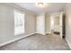 Bedroom with a closet and window overlooking the yard at 1157 Cedar Grove Ln, Rock Hill, SC 29732