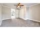 Bedroom showcases a ceiling fan and a doorway to another room at 1157 Cedar Grove Ln, Rock Hill, SC 29732