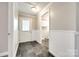 Hallway with slate tile flooring and wainscoting at 1157 Cedar Grove Ln, Rock Hill, SC 29732