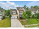 Well-maintained home with a two-car garage, lush lawn, and mature trees in a desirable neighborhood at 1224 Screech Owl Rd, Waxhaw, NC 28173