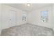 Cozy bedroom offers bright natural light, plush carpet, and neutral decor at 1243 Pebble Grove Dr # 442, Clover, SC 29710