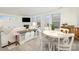 Bright open-concept living area with a fireplace, dining space, and lots of natural light at 1243 Pebble Grove Dr # 442, Clover, SC 29710