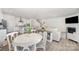 Open-concept living space with eat-in kitchen, cozy living area, and staircase at 1243 Pebble Grove Dr # 442, Clover, SC 29710