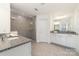 Bathroom with tile shower, double vanity, and white cabinets provides ample space and a clean look at 1243 Pebble Grove Dr # 442, Clover, SC 29710