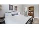 Comfortable bedroom features a bed with fresh linens, a side table, and decor at 1255 Fishing Creek Rd, Clover, SC 29710