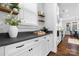 Bright kitchen featuring white cabinets, dark countertops, and stainless steel appliances at 1255 Fishing Creek Rd, Clover, SC 29710