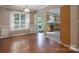 Dining room with hardwood flooring leading to the kitchen at 12604 Cardinal Point Rd, Charlotte, NC 28269