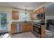 Beautiful kitchen with stainless steel appliances, and granite countertops at 12604 Cardinal Point Rd, Charlotte, NC 28269