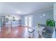 Inviting dining area connected to the kitchen, featuring a built-in booth and French doors to the backyard at 12842 Plaza Road Ext, Charlotte, NC 28215