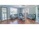 Welcoming living room with comfortable seating, and hardwood floors at 12842 Plaza Road Ext, Charlotte, NC 28215