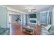 Spacious living room with fireplace, hardwood floors and lots of natural light at 12842 Plaza Road Ext, Charlotte, NC 28215
