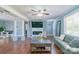 Bright, open living area showcasing a fireplace and an open floorplan at 12842 Plaza Road Ext, Charlotte, NC 28215