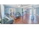 Spacious living room showcasing hardwood floors and open layout to the kitchen at 12842 Plaza Road Ext, Charlotte, NC 28215