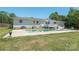 This backyard features a large pool and deck, perfect for enjoying outdoor living at 12842 Plaza Road Ext, Charlotte, NC 28215