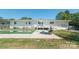Enjoy the backyard with a pool, a deck and a lounge chair in a sunny day at 12842 Plaza Road Ext, Charlotte, NC 28215