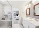 Modern bathroom with double vanity and glass shower at 13102 Petrel Pl, Charlotte, NC 28278