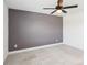 Spacious bedroom featuring neutral tones, modern lighting, carpeted floors, and ample natural light at 13102 Petrel Pl, Charlotte, NC 28278
